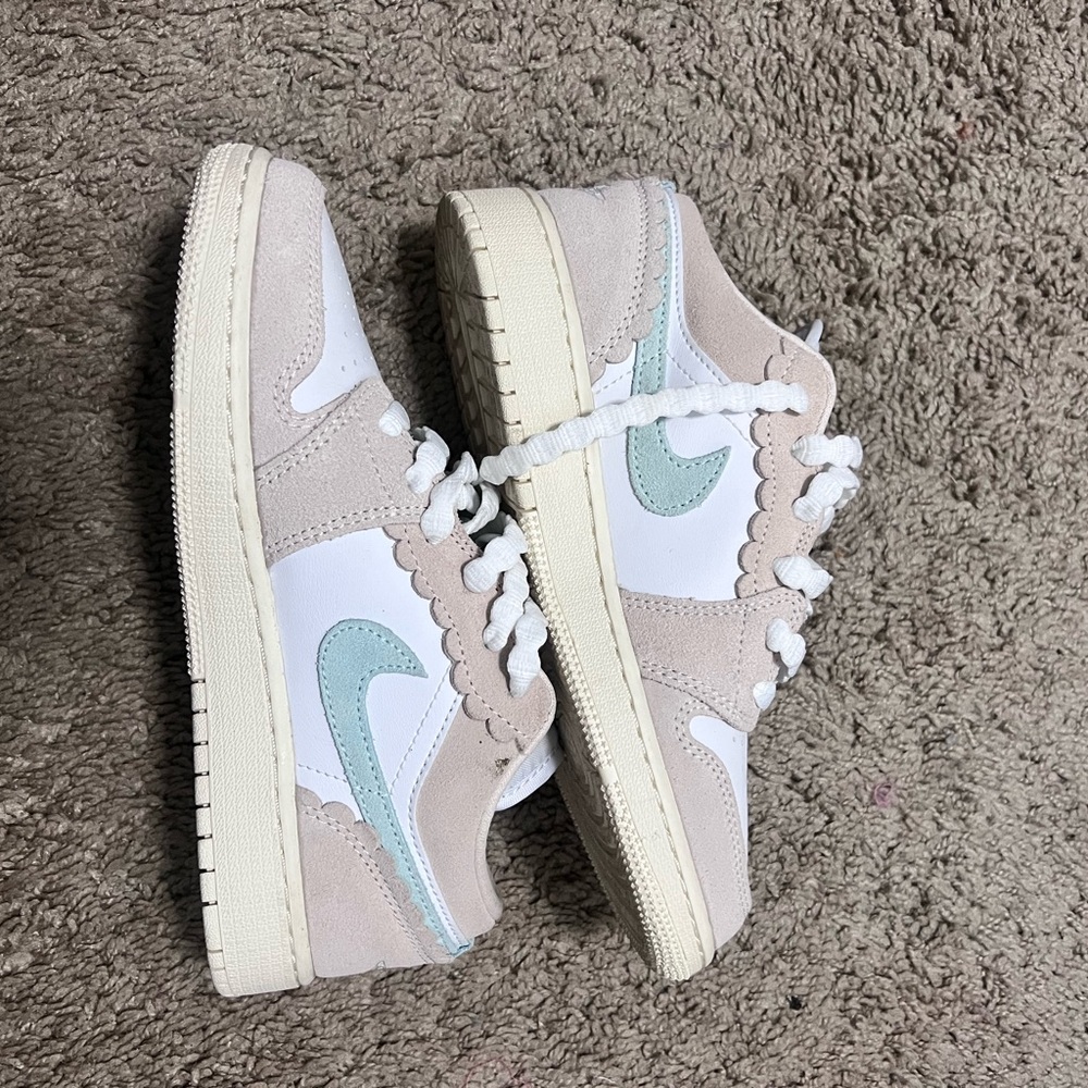 Stylish Beige and White Sneakers with Blue Accents